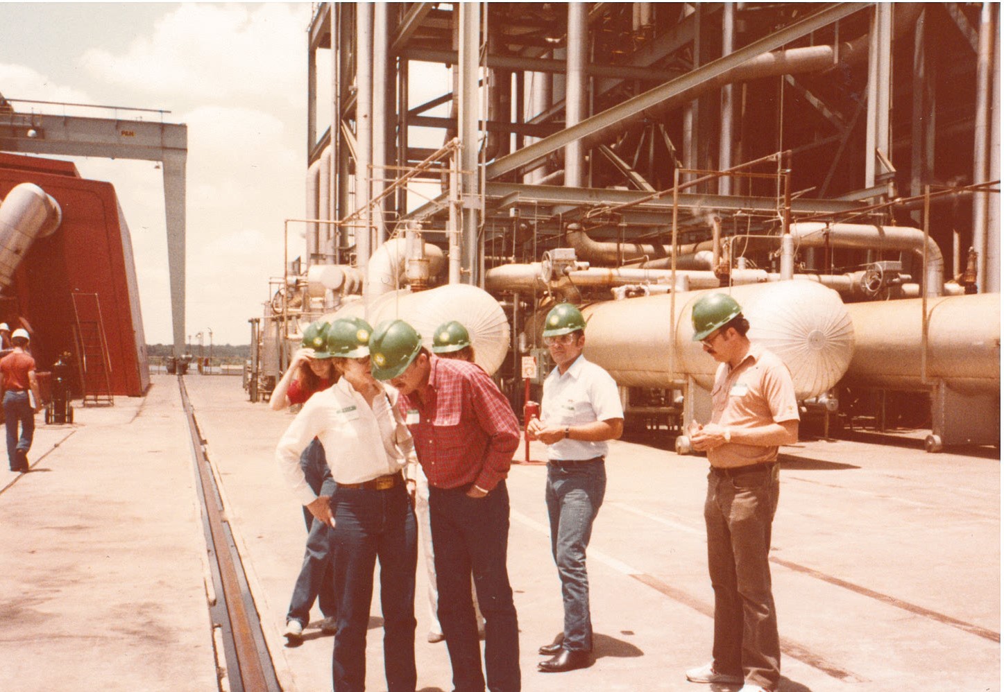 Chairman Alan Erwin (red shirt) and others on a site visit.