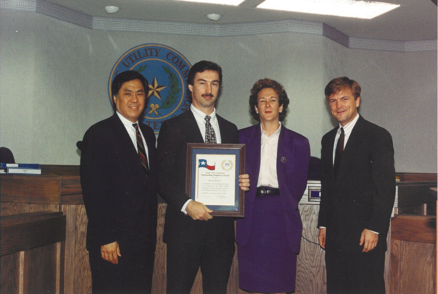 PUCT employee Darryl Tietjen receives employee of the quarter award in June 1995. He's still here 30 years later, leading the Rate Regulation Division.