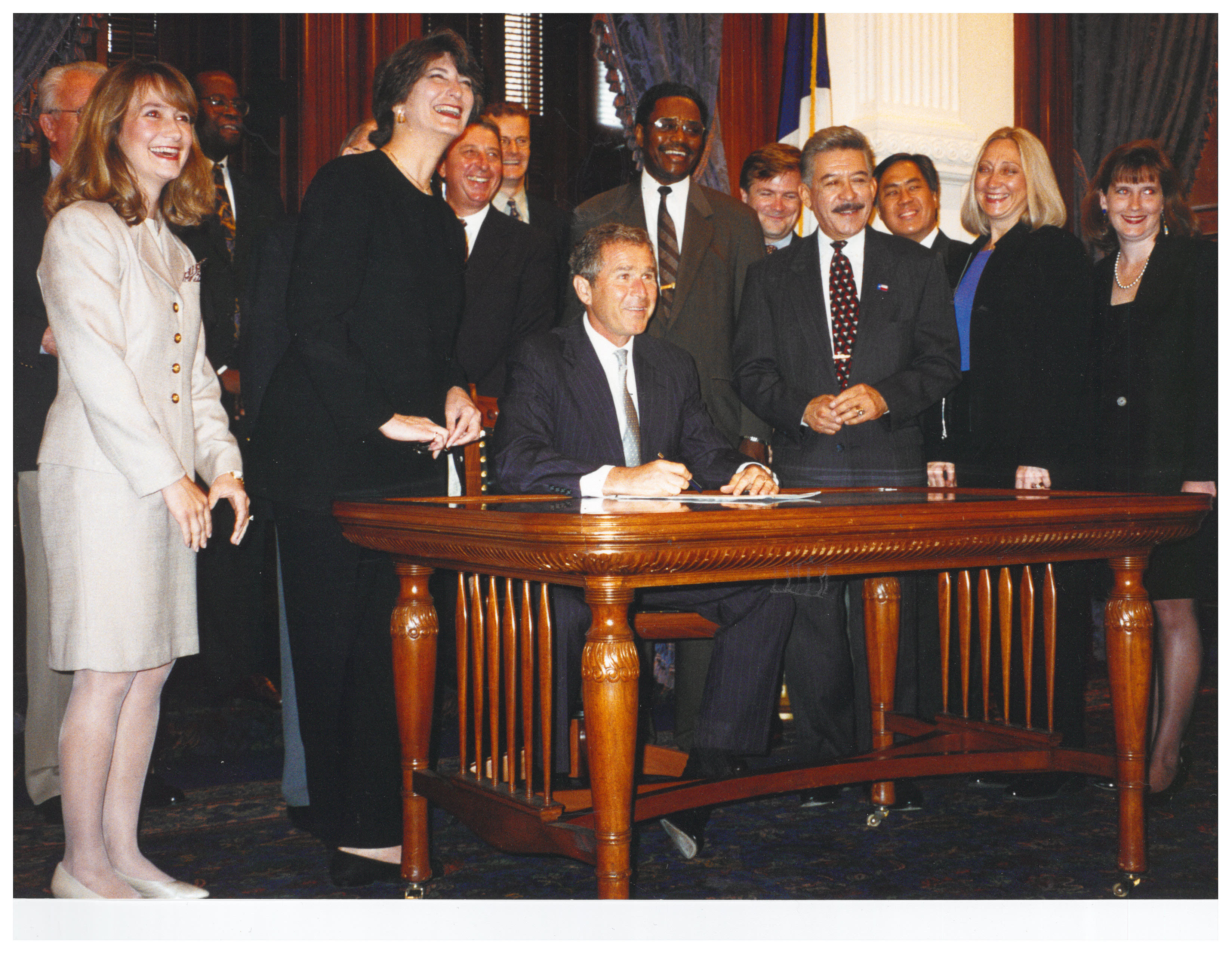Gov. George W. Bush signs Senate Bill 253, passed by the 75th Texas Legislature. The bill outlawed the practice of 