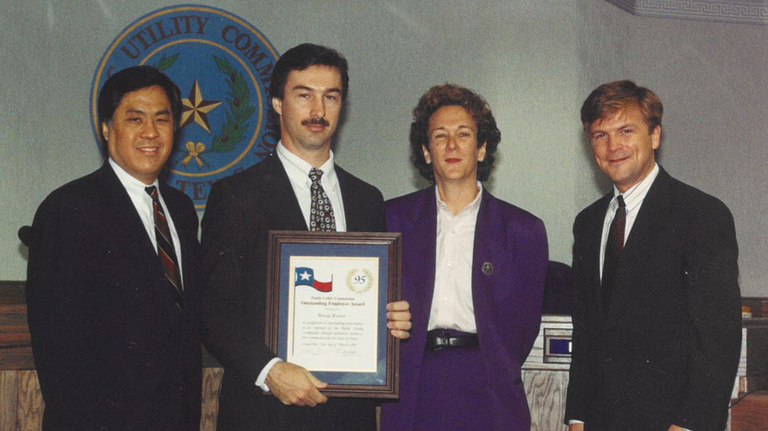 PUCT employee Darryl Tietjen receives employee of the quarter award in June 1995. He's still here 30 years later, leading the Rate Regulation Division.